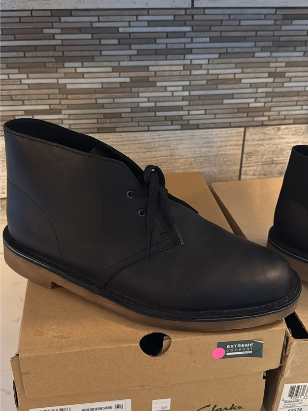 Clarks Men’s Black Leather Chukka Boots with Tan Crepe Sole